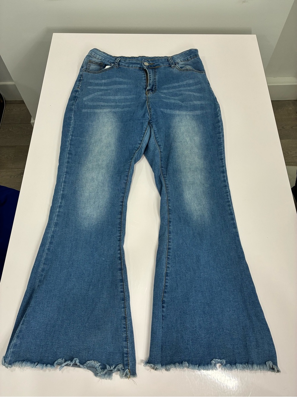 SHEIN Blue High-Rise Flare Jeans with Raw Hem
